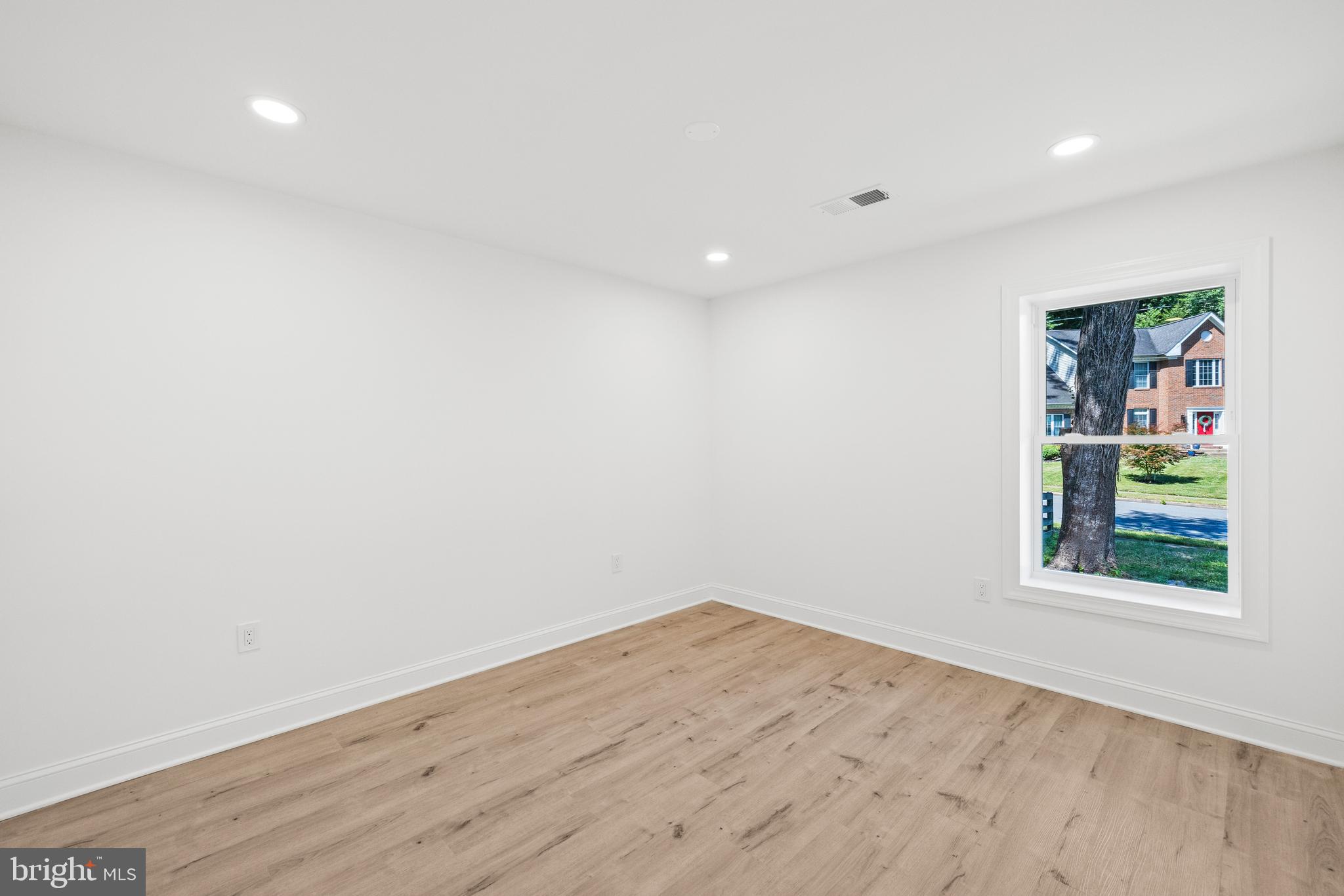 7129 Catlett Street Springfield, VA 22151 - Photo 23 of 34 an empty room with a window