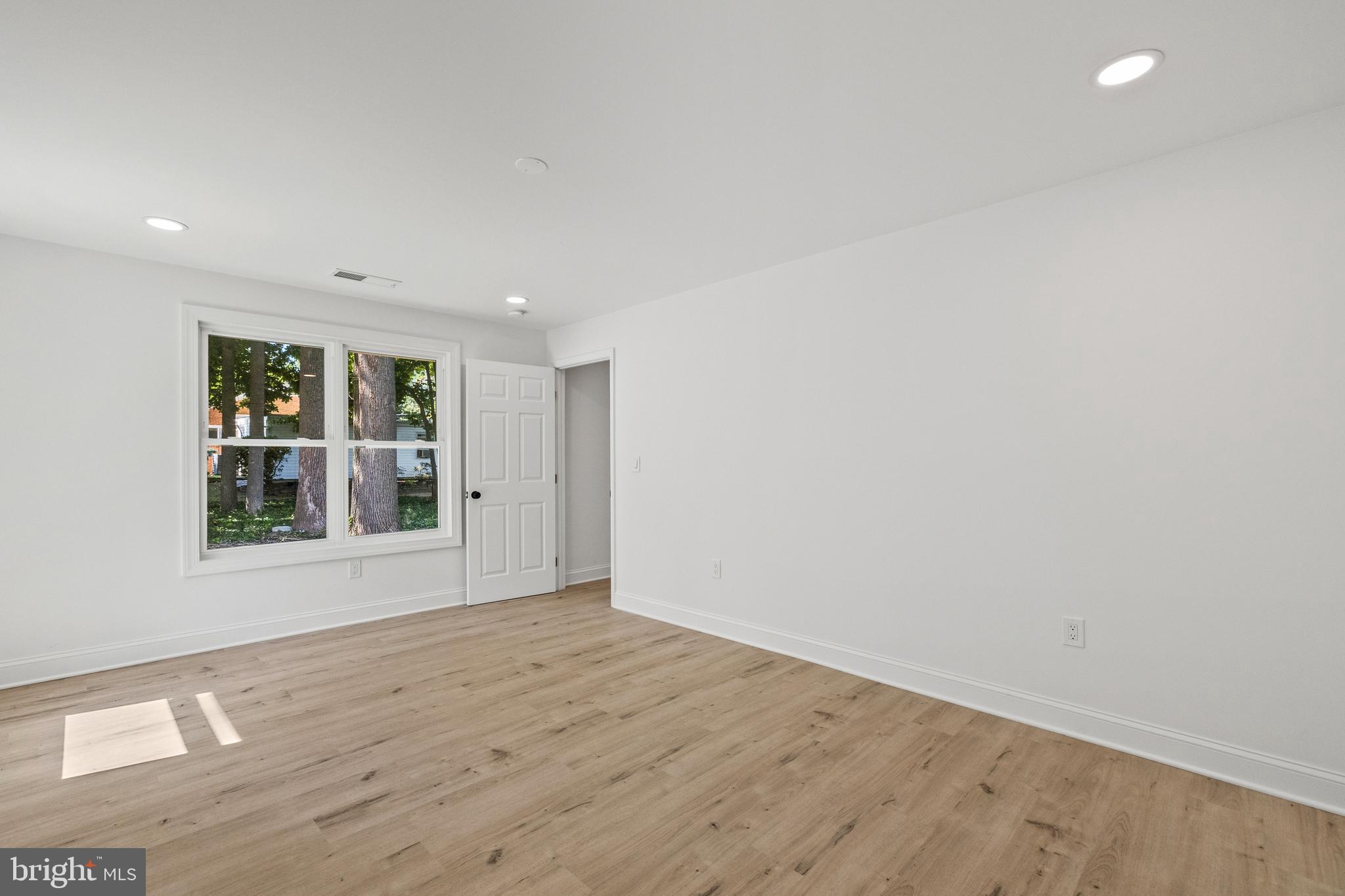 7129 Catlett Street Springfield, VA 22151 - Photo 30 of 34 an empty room with a window
