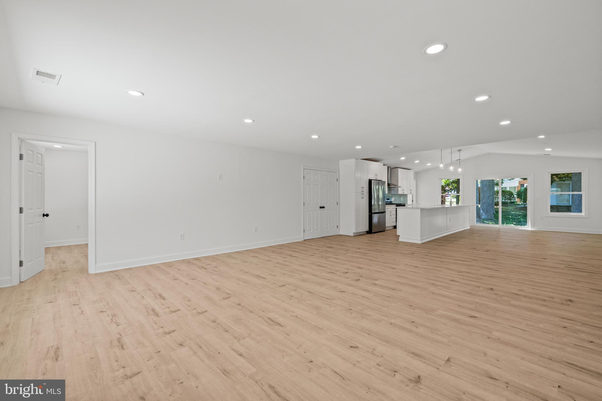 7129 Catlett Street Springfield, VA 22151 - Photo 5 of 34 a view of empty room with wooden floor