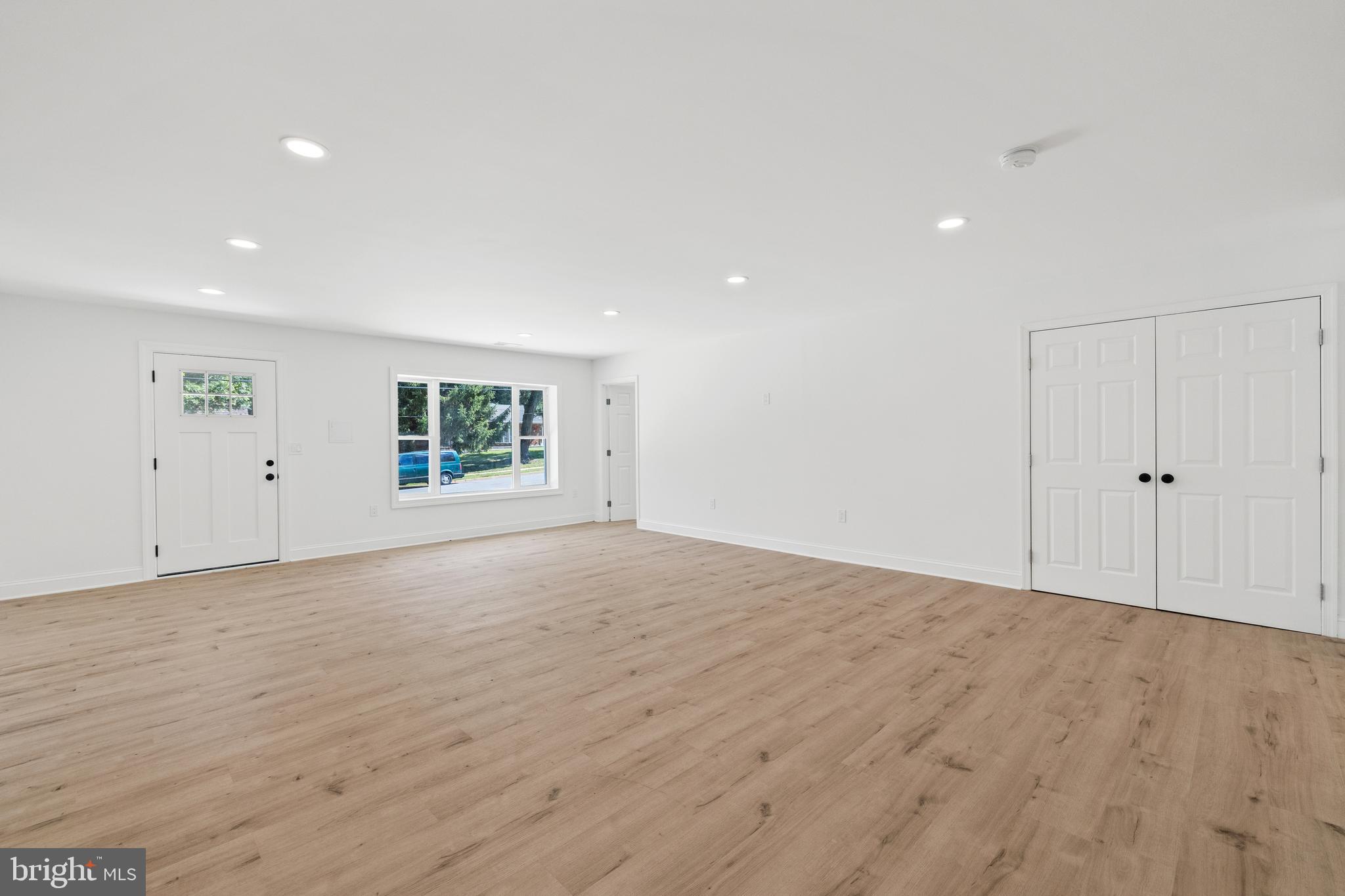 7129 Catlett Street Springfield, VA 22151 - Photo 7 of 34 a view of an empty room with a window