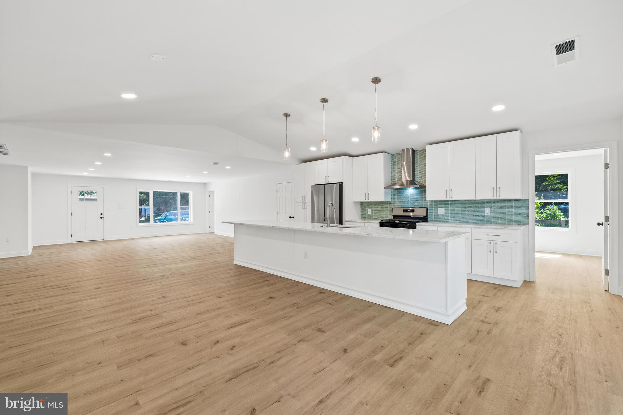7129 Catlett Street Springfield, VA 22151 - Photo 9 of 34 a view of kitchen with wooden floor