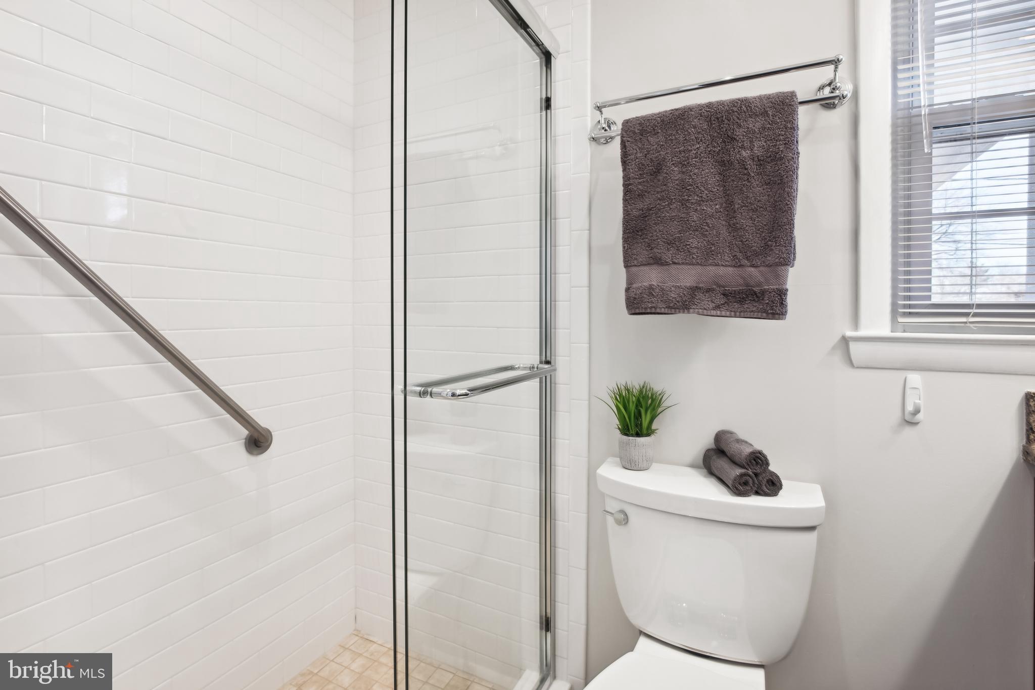 6001 Meriwether Lane Springfield, VA 22150 - Photo 18 of 50 Primary Bath Shower w/Subway Tile