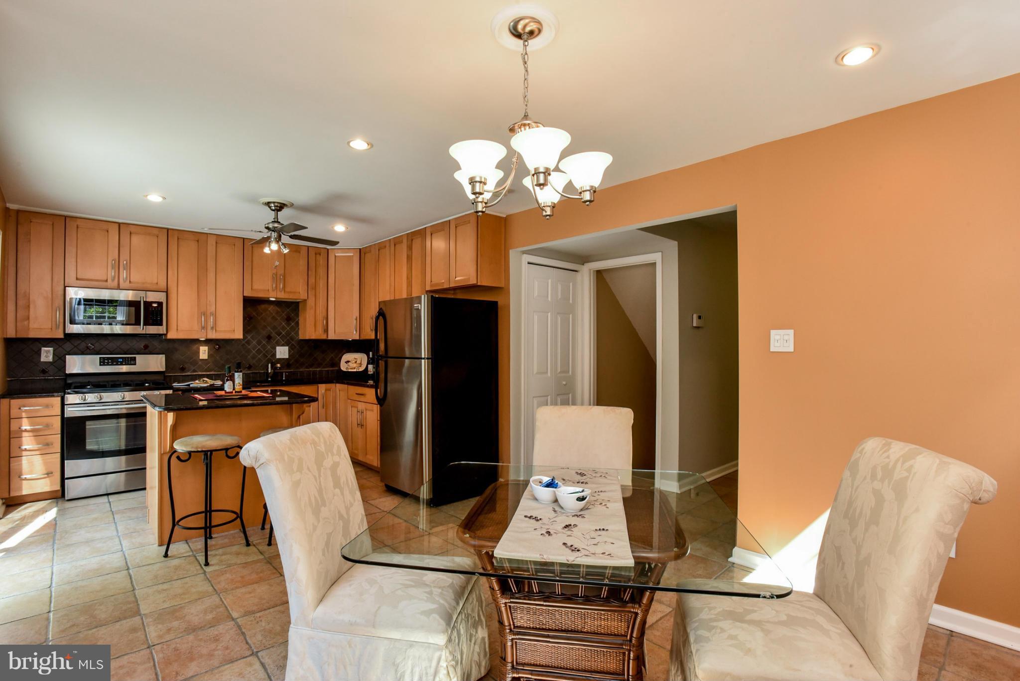 2423 Ansdel Court Reston, VA 20191 - Photo 9 of 30 Dining Area into Kitchen