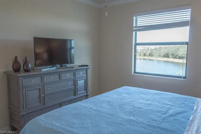 a bathroom with a granite countertop toilet and a sink