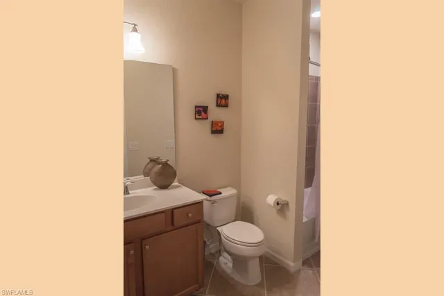 a balcony with table and chairs