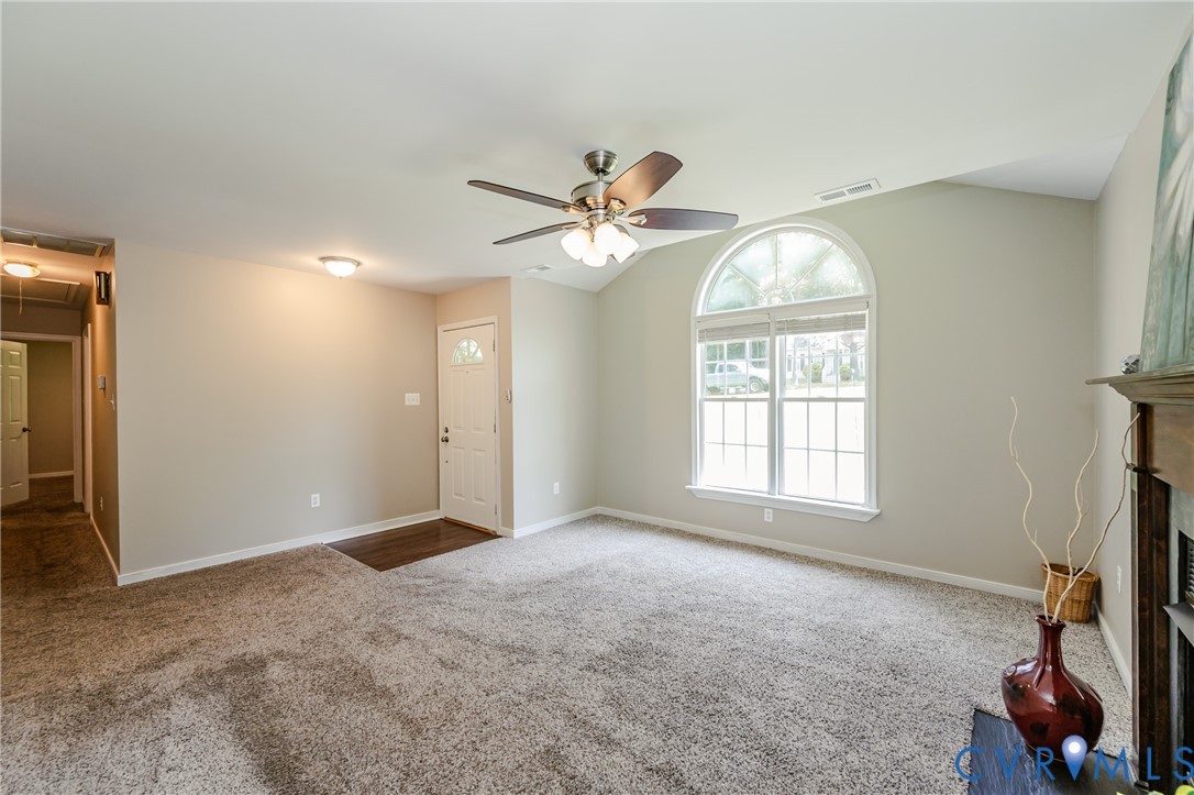 3024 Gregwood Road Midlothian, VA 23112 - Photo 13 of 49 Unfurnished living room featuring carpet, attic ac