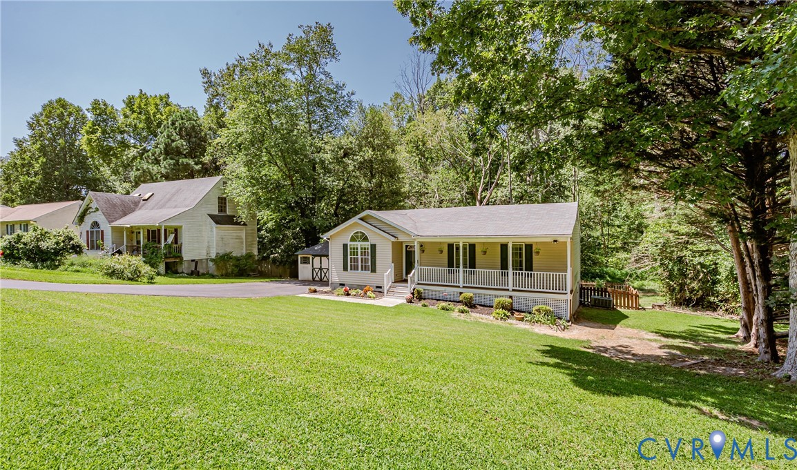 3024 Gregwood Road Midlothian, VA 23112 - Photo 2 of 49 Ranch-style house with covered porch, a front yard