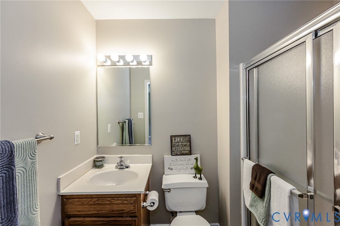 3024 Gregwood Road Midlothian, VA 23112 - Photo 29 of 49 Primary bdrm Full bath with vanity and a shower wi