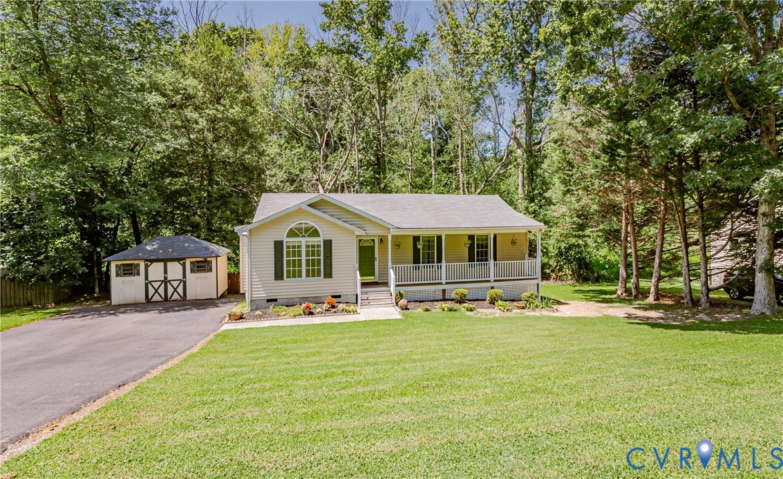 3024 Gregwood Road Midlothian, VA 23112 - Photo 3 of 49 View of front of home with a storage shed, covered
