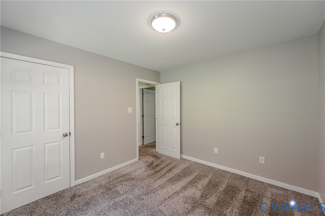 3024 Gregwood Road Midlothian, VA 23112 - Photo 33 of 49 Back/2nd bedroom with carpet and baseboards