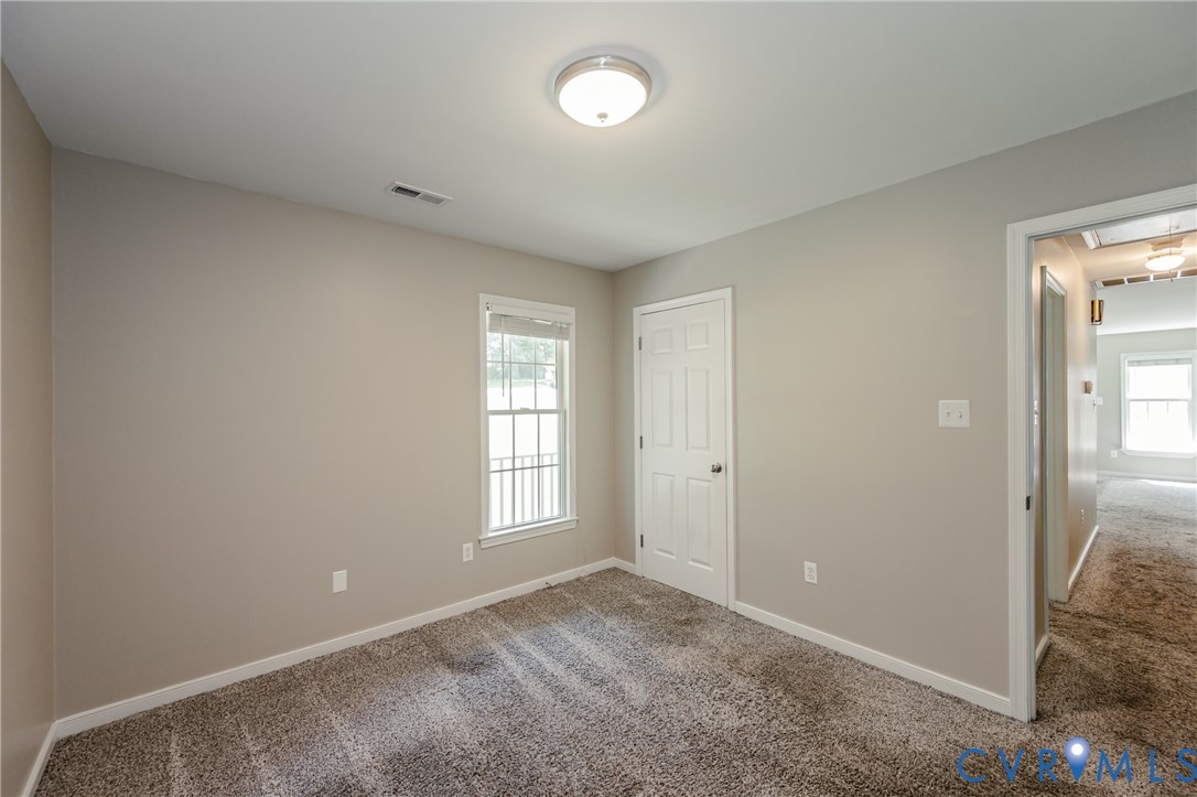 3024 Gregwood Road Midlothian, VA 23112 - Photo 34 of 49 Back/2nd bedroom with view of closet & hallway