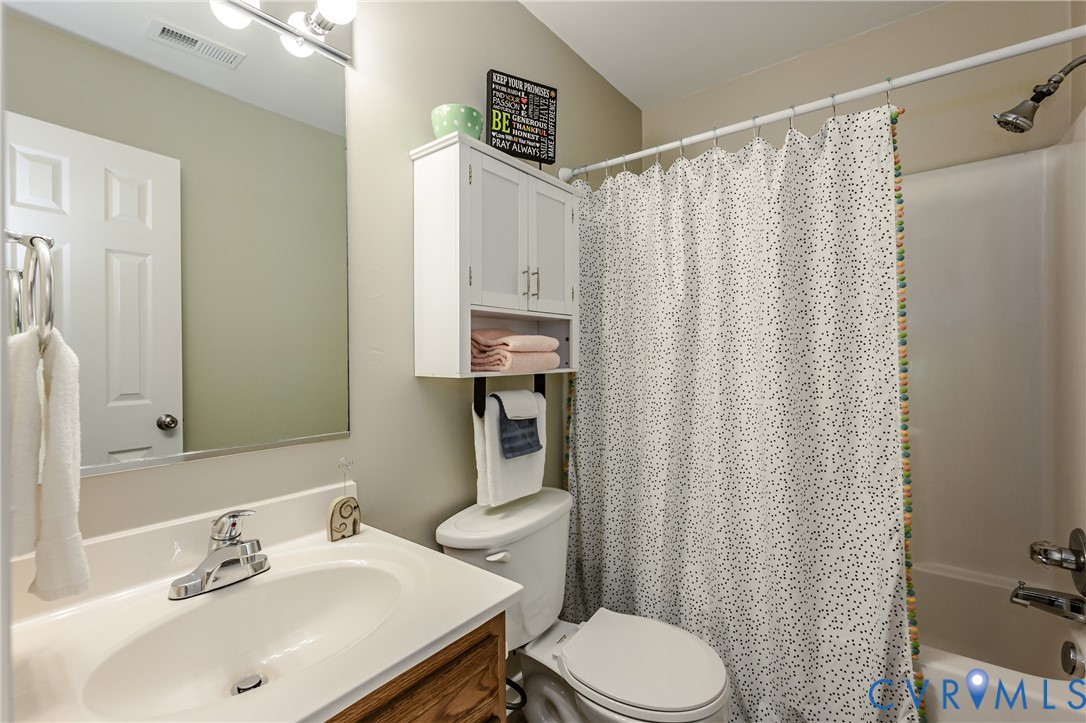 3024 Gregwood Road Midlothian, VA 23112 - Photo 36 of 49 Hallway Full bathroom with vanity and shower / bat