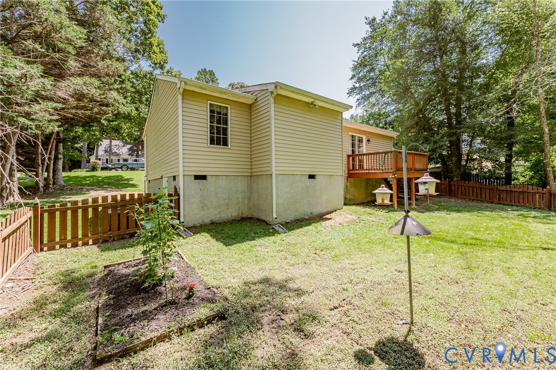 3024 Gregwood Road Midlothian, VA 23112 - Photo 45 of 49 Back of property with a fenced backyard, crawl spa