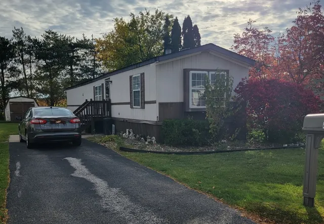 a car parked in front of a house