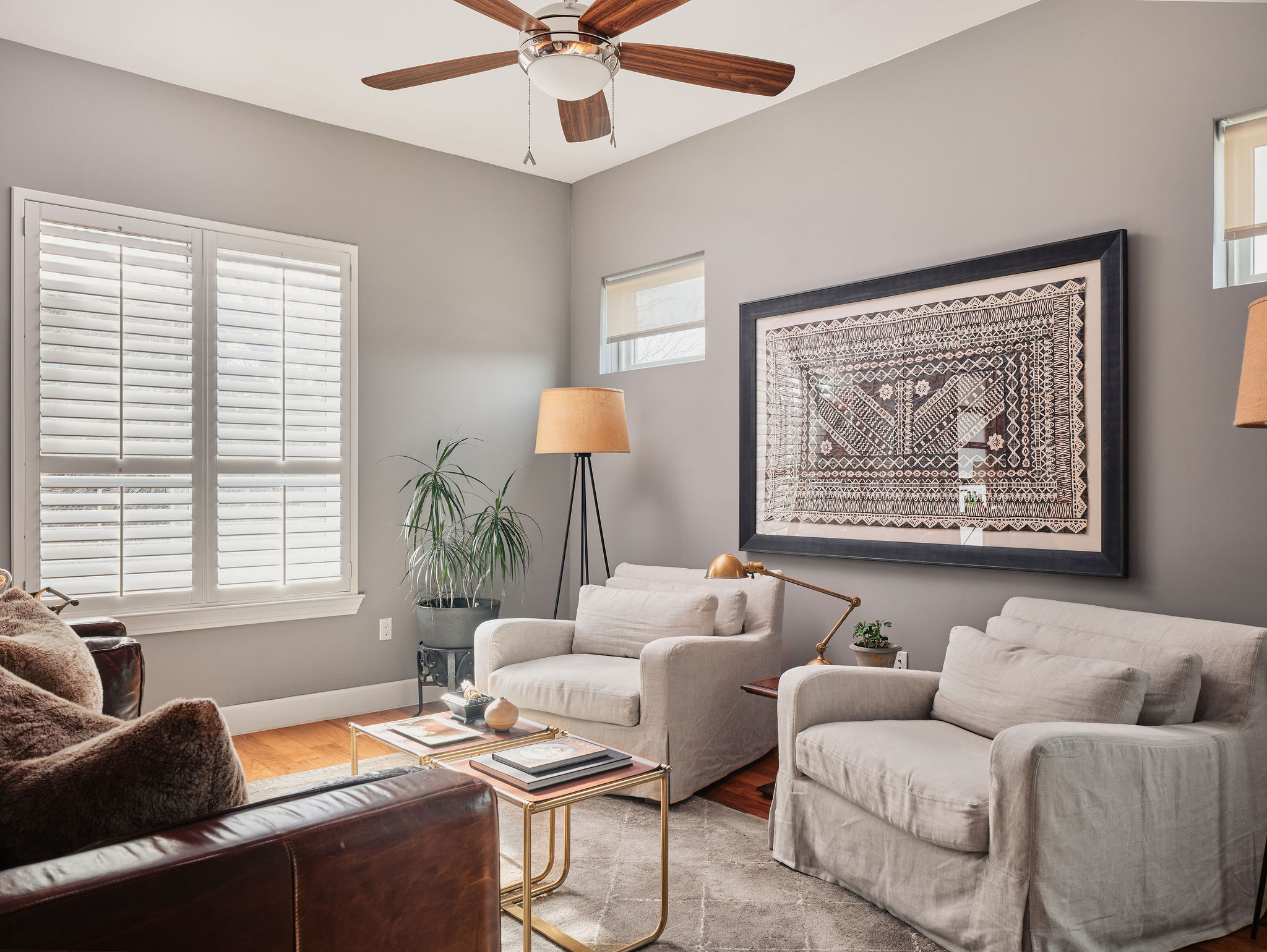 1504 Collier Street, Unit 4 Austin, TX 78704 - Photo 7 of 38 Living area with ceiling fan and wood finished floors