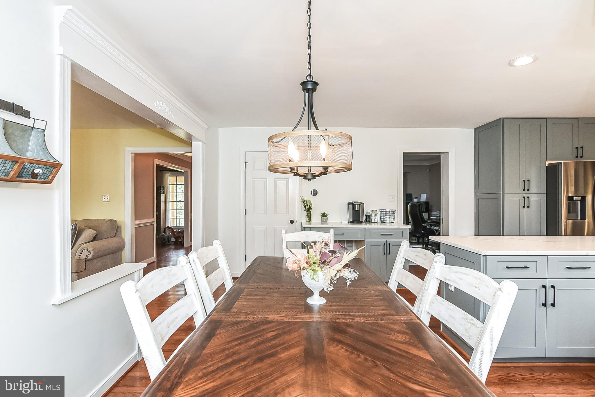 12517 Kent Road King George, VA 22485 - Photo 15 of 65 Living Room/Table Space/Kitchen View