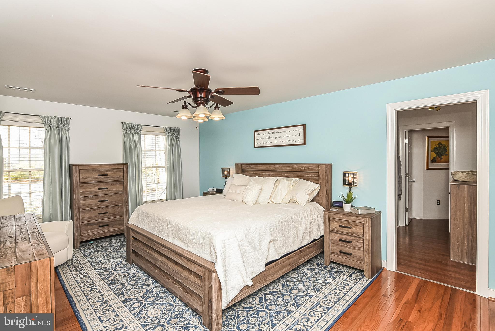 12517 Kent Road King George, VA 22485 - Photo 30 of 65 Primary Bedroom with Ceiling Fan & Hardwood Floors