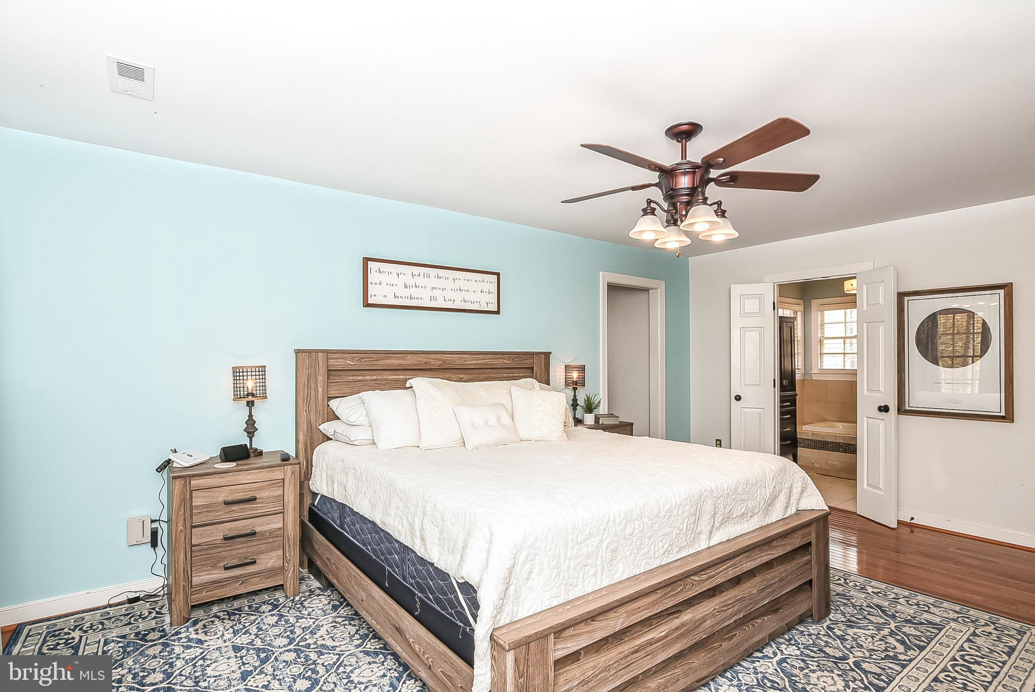 12517 Kent Road King George, VA 22485 - Photo 31 of 65 Primary Bedroom with Ceiling Fan & Hardwood Floors