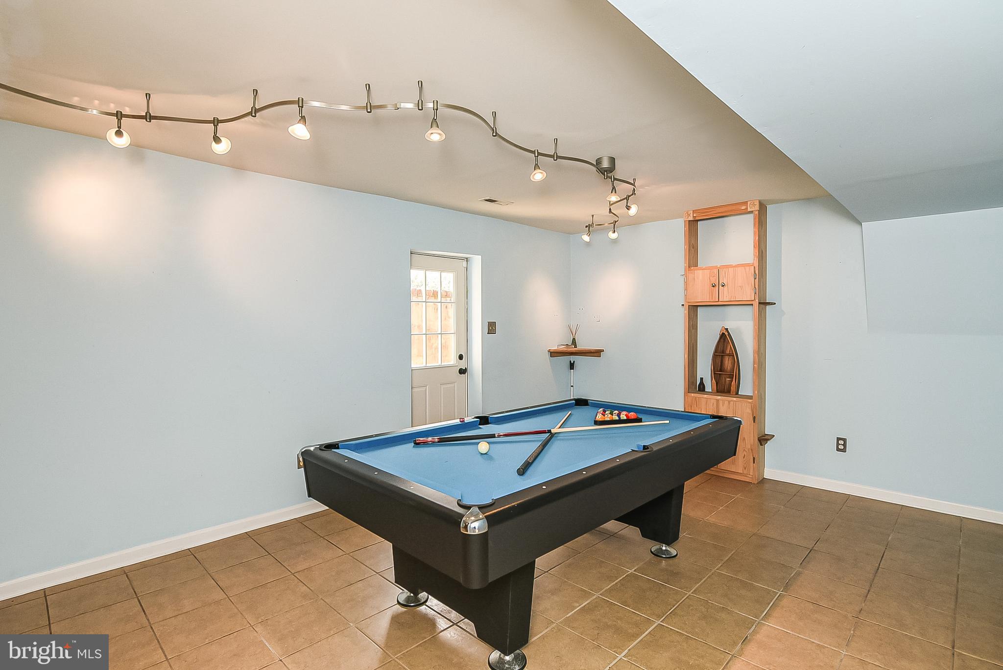 12517 Kent Road King George, VA 22485 - Photo 55 of 65 Basement Great Room w/Walk Up Stairs to Rear Patio