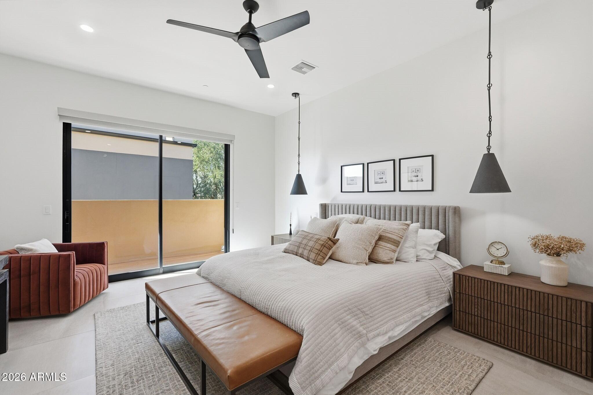 6525 East Cave Creek Road, Unit 201 Cave Creek, AZ 85331 - Photo 16 of 33 a bedroom with a large bed and a window