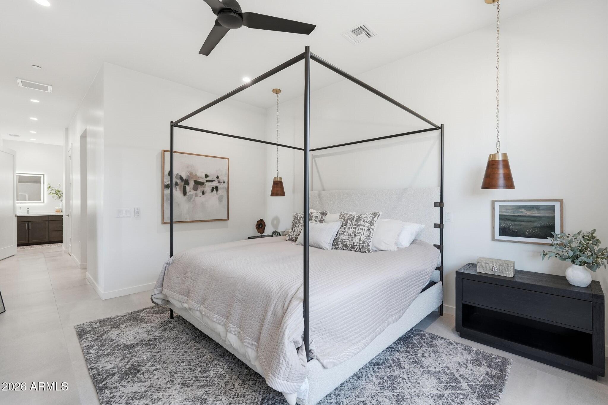 6525 East Cave Creek Road, Unit 201 Cave Creek, AZ 85331 - Photo 21 of 33 a bedroom with a bed and a dresser
