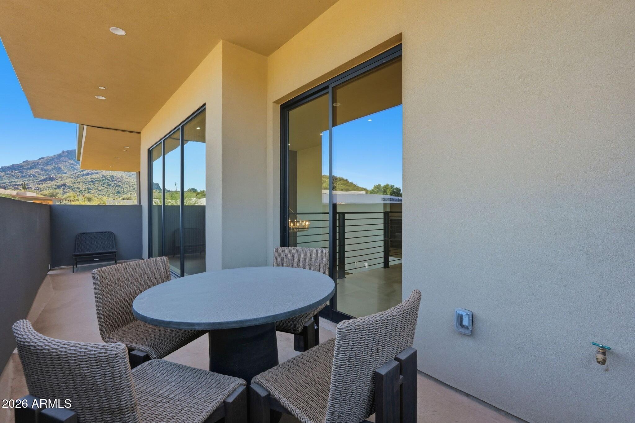 6525 East Cave Creek Road, Unit 201 Cave Creek, AZ 85331 - Photo 26 of 33 a view of a dining room with furniture