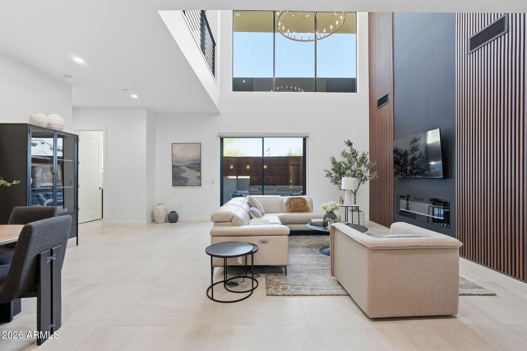 6525 East Cave Creek Road, Unit 201 Cave Creek, AZ 85331 - Photo 3 of 33 a living room with furniture and a potted plant