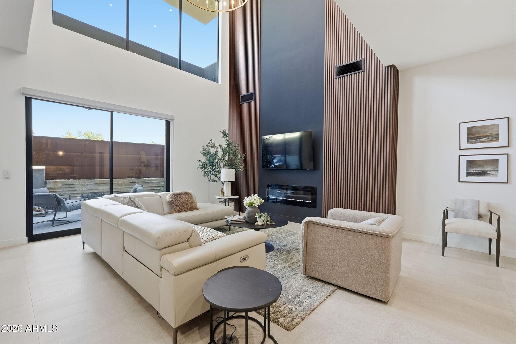 6525 East Cave Creek Road, Unit 201 Cave Creek, AZ 85331 - Photo 6 of 33 a living room with furniture and a large window