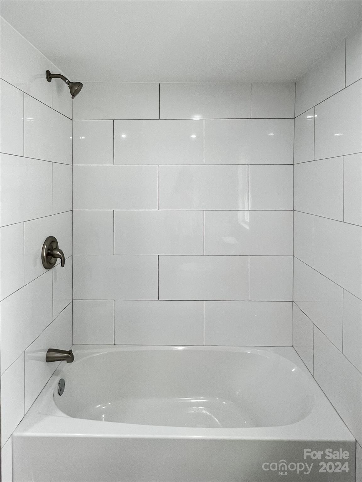816 Laton Road Albemarle, NC 28001 - Photo 21 of 28 a bathroom with a bathtub