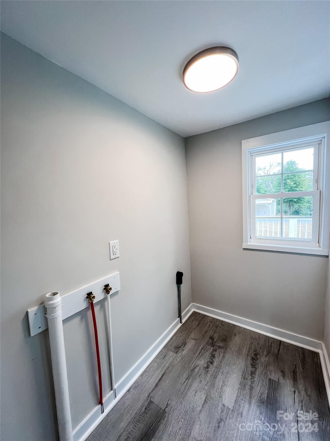 816 Laton Road Albemarle, NC 28001 - Photo 26 of 28 a view of a room with wooden floor and window