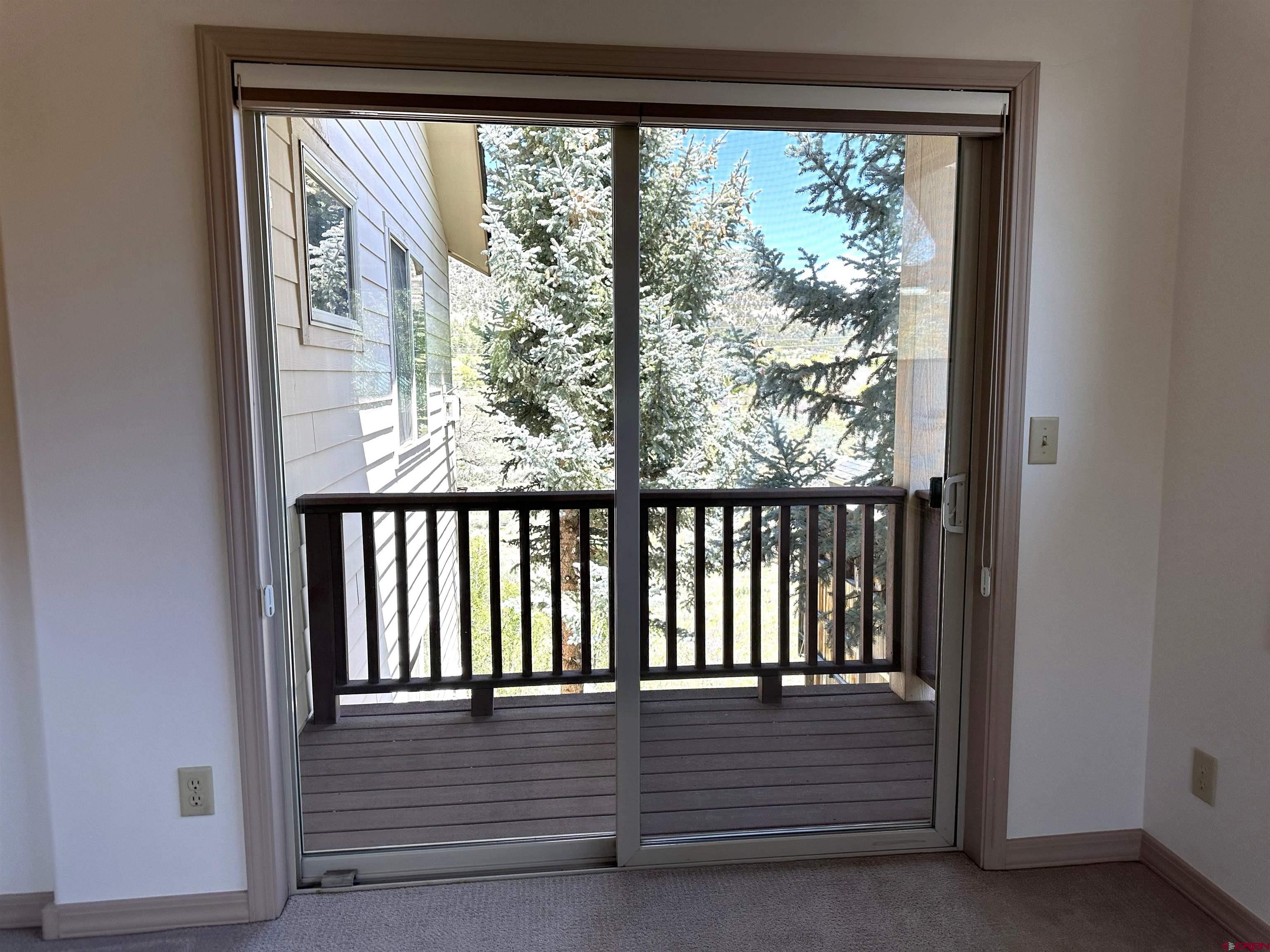 35 Sunshine Court, Unit 6 Durango, CO 81301 - Photo 19 of 37 Slider with a screen opens to deck.