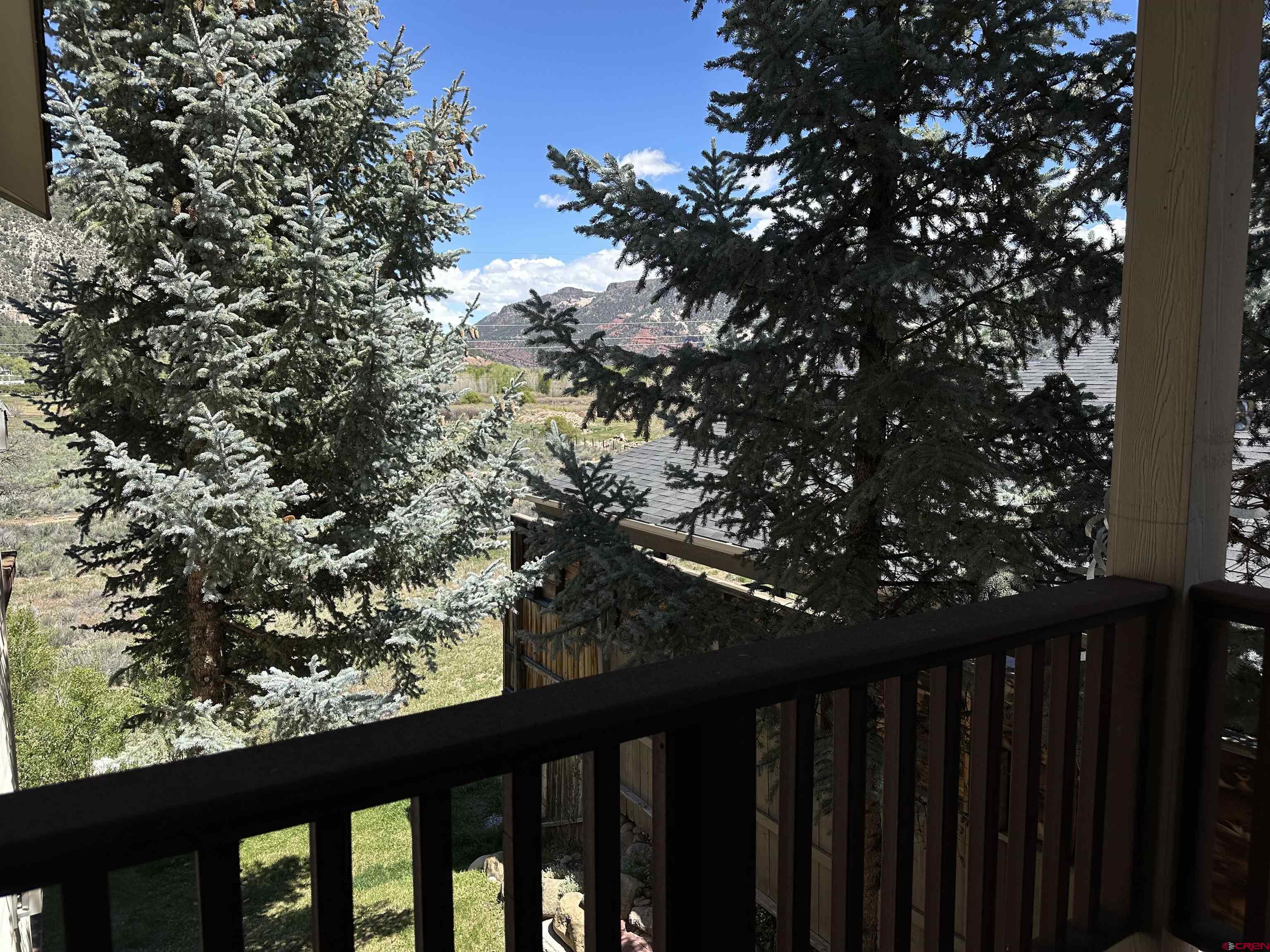 35 Sunshine Court, Unit 6 Durango, CO 81301 - Photo 20 of 37 Views of the Animas Valley from the deck. Lots of Blue Spruce Pines.