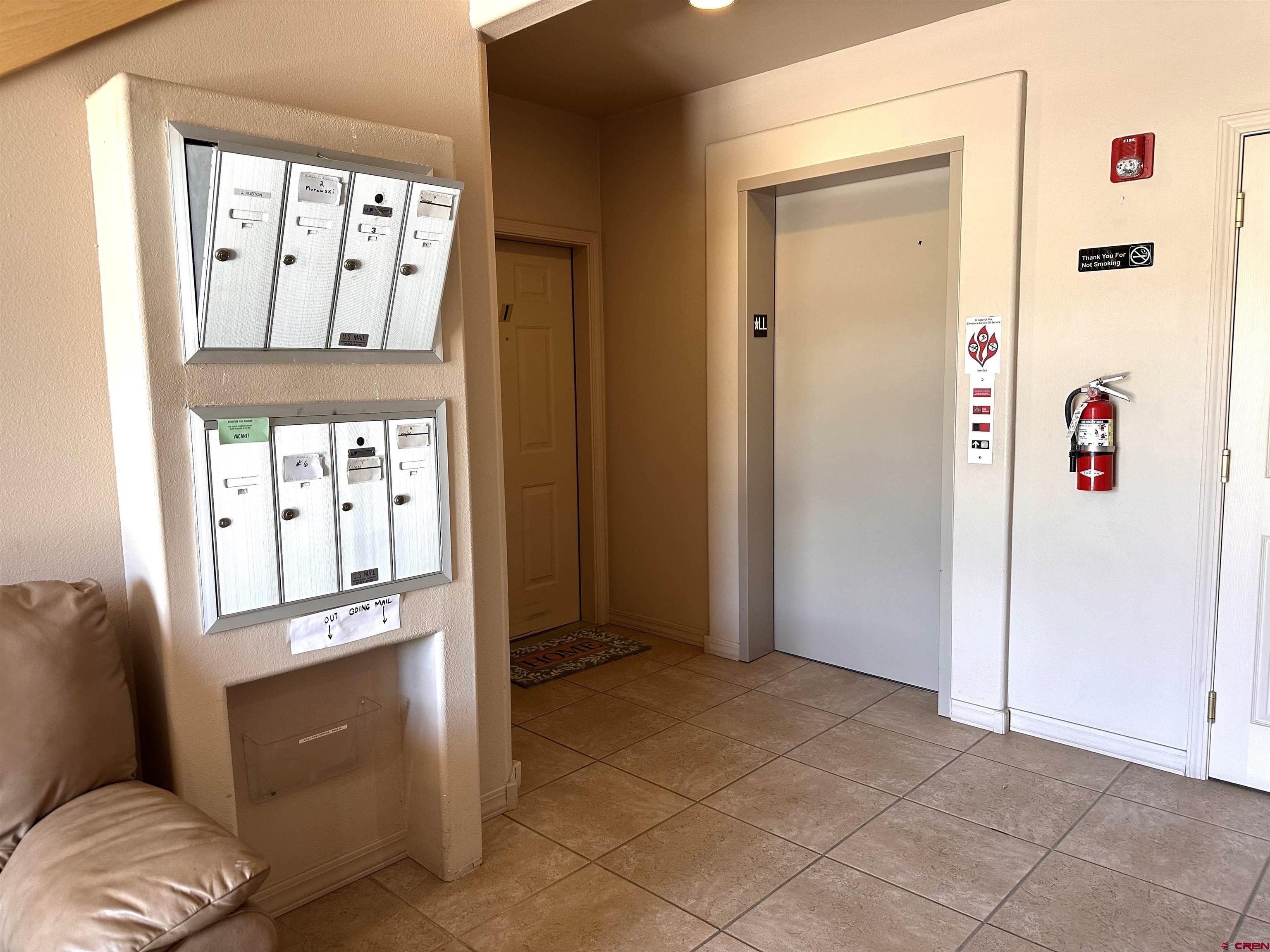 35 Sunshine Court, Unit 6 Durango, CO 81301 - Photo 4 of 37 Elevator and Mailboxes on 1st Floor Foyer