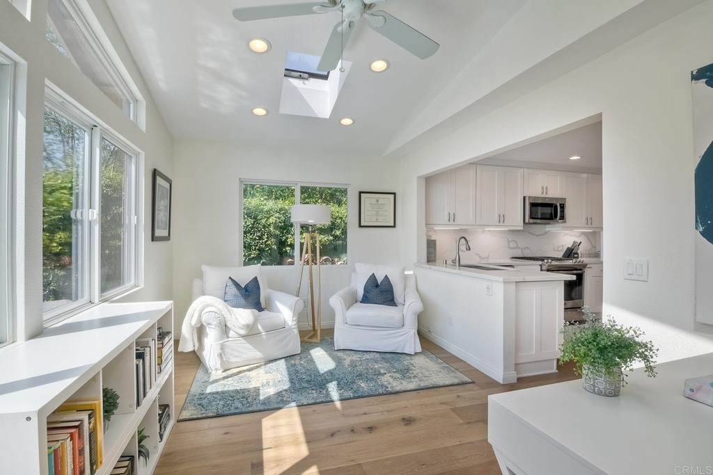 631 Dell Street Solana Beach, CA 92075 - Photo 20 of 36 a living room with furniture kitchen and a large window