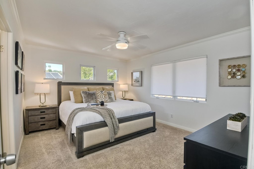 631 Dell Street Solana Beach, CA 92075 - Photo 22 of 36 a bedroom with a bed and a desk