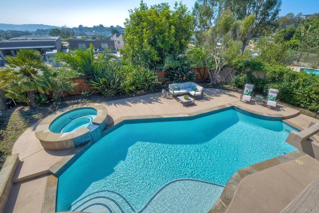 631 Dell Street Solana Beach, CA 92075 - Photo 31 of 36 a view of a swimming pool with a patio