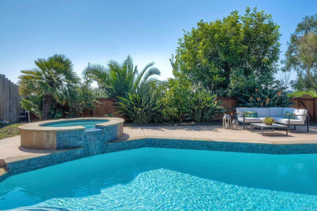 631 Dell Street Solana Beach, CA 92075 - Photo 33 of 36 a view of swimming pool with lawn chairs and plants