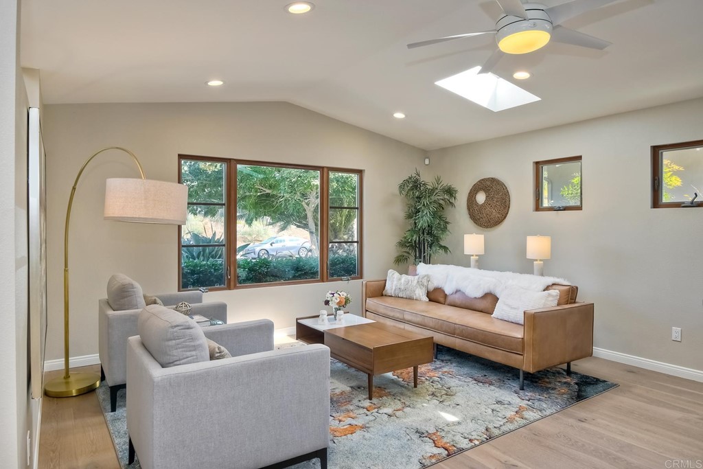 631 Dell Street Solana Beach, CA 92075 - Photo 6 of 36 a living room with furniture and a large window