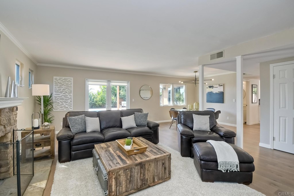 631 Dell Street Solana Beach, CA 92075 - Photo 10 of 36 a living room with furniture and a large window