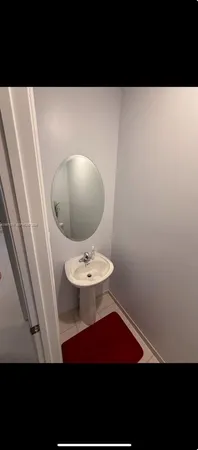 a view of a bathroom with a sink and a toilet