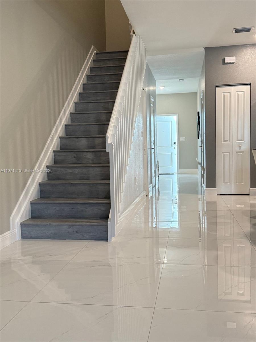 25265 Southwest 109th Avenue, Unit 25265 Homestead, FL 33032 - Photo 9 of 18 a view of entryway