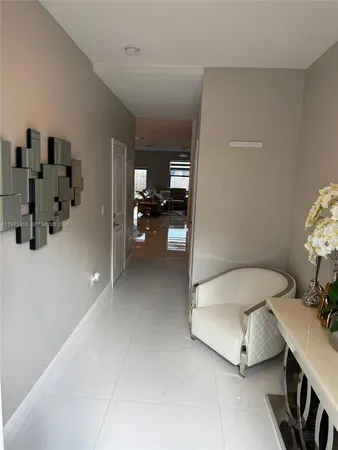 a room with furniture and gym equipment