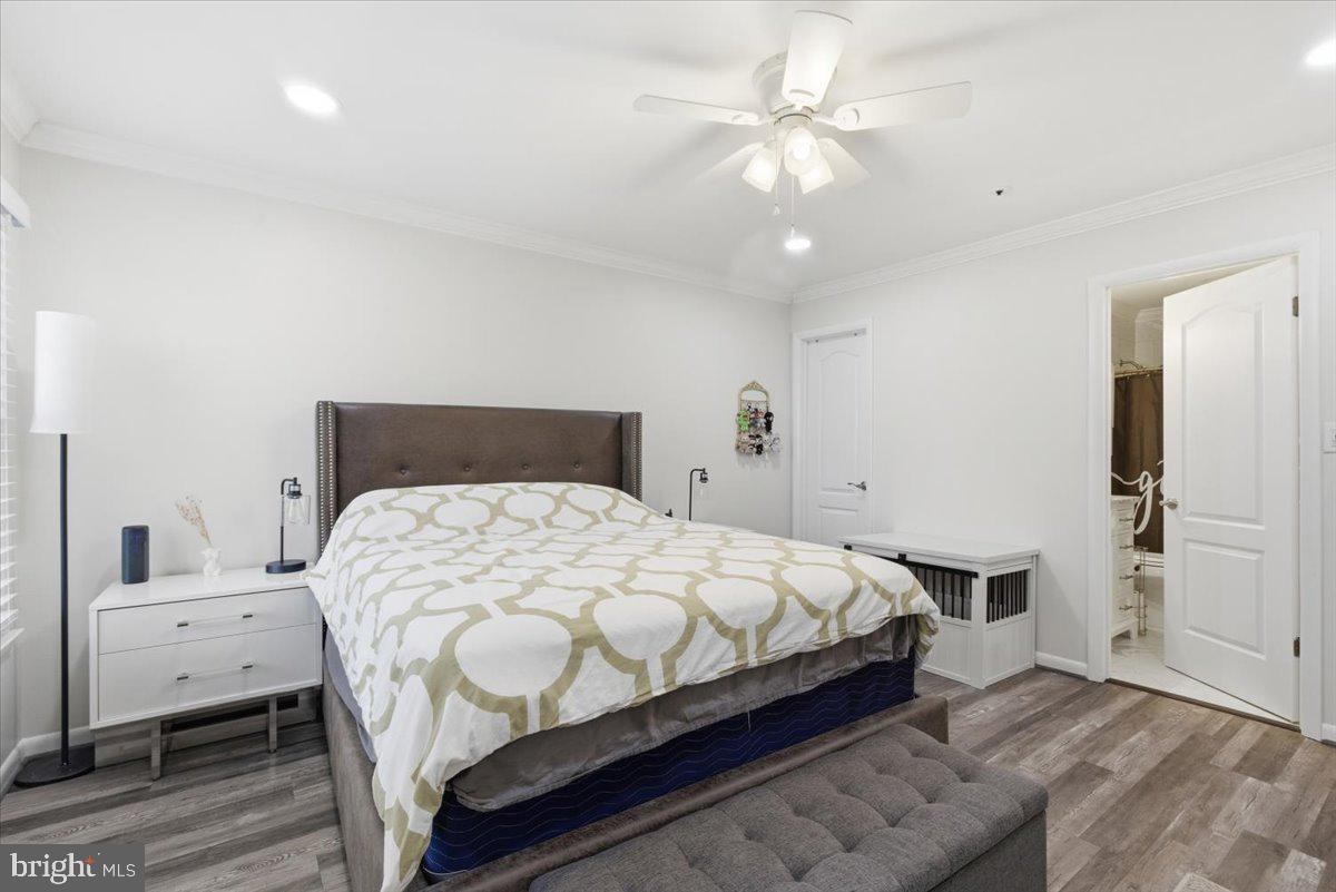 1008 Spring Valley Court Fort Washington, MD 20744 - Photo 18 of 26 Serene bedroom with modern elegance.