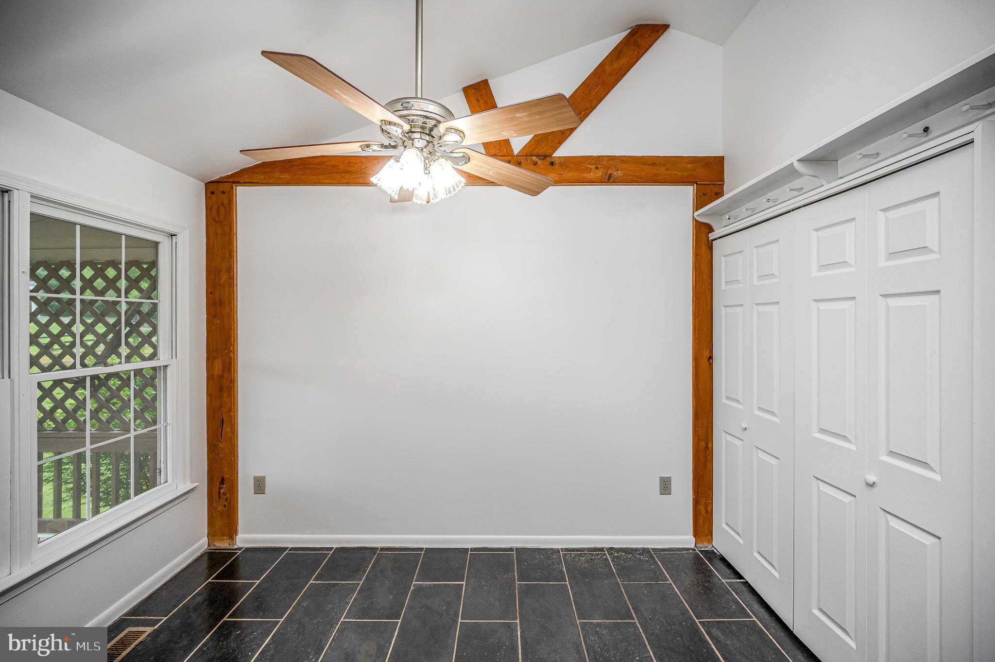 6317 Louisianna Road Locust Grove, VA 22508 - Photo 16 of 57 Dining area with tiled flooring and high ceiling.