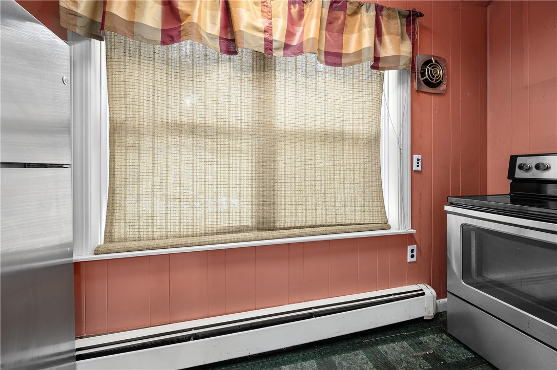 302 Providence Street Woonsocket, RI 02895 - Photo 8 of 38 First Floor Pantry - Stove and Refrigerator