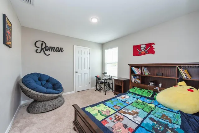 a living room with a couch and a table