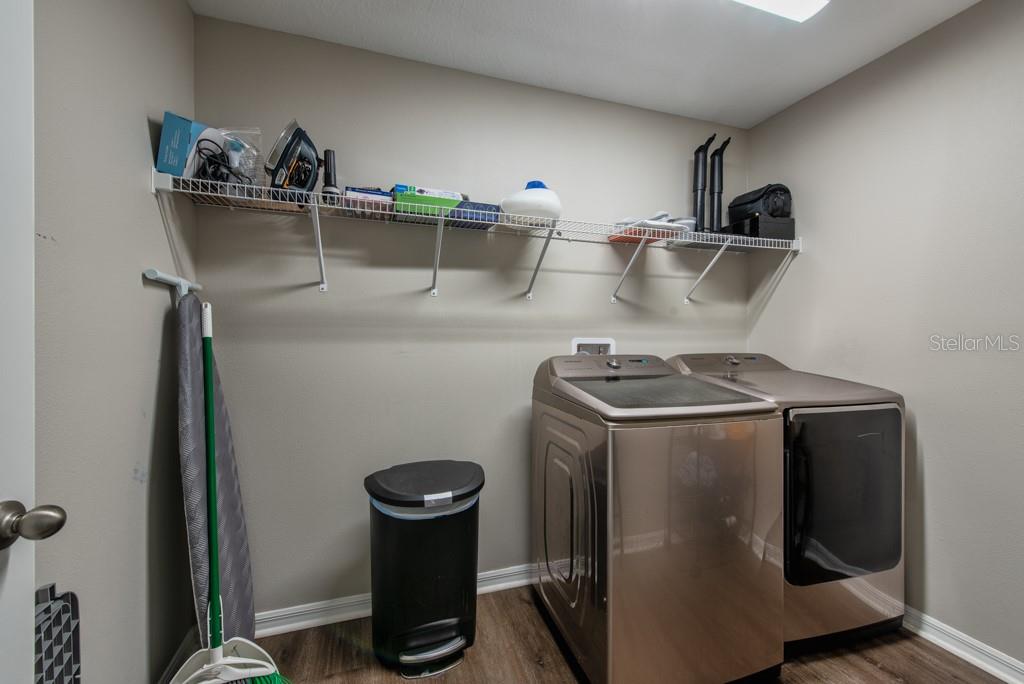 14617 Brumby Ridge Avenue Lithia, FL 33547 - Photo 29 of 46 a utility room with dryer and washer