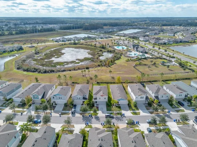a view of swimming pool with a yard