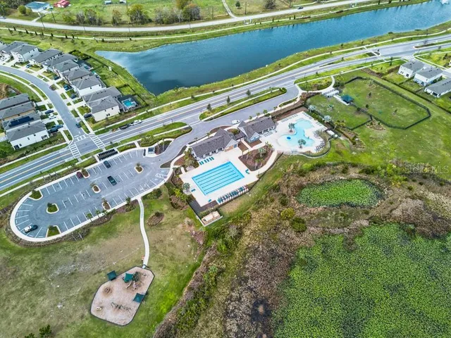 a view of a lake with a big yard