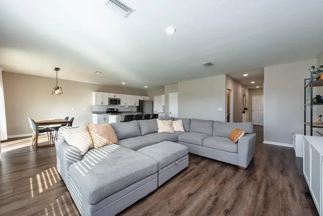 a living room with furniture and a couch